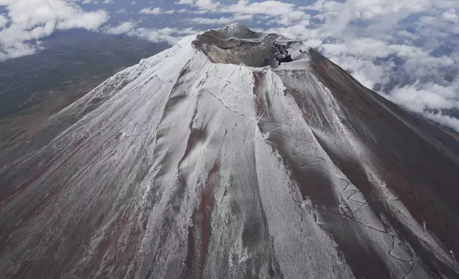 Mt. Fuji in Japan is covered with snow Wednesday, Nov. 6, 2024. (Kyodo News via AP)