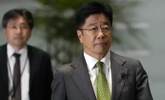 Finance Minister Katsunobu Kato arrives at the prime minister's office Monday, Nov. 11, 2024, in Tokyo. (AP Photo/Shuji Kajiyama)