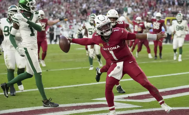 Arizona Cardinals quarterback Kyler Murray (1) celebrates his touchdown against the New York Jets during the second half of an NFL football game, Sunday, Nov. 10, 2024, in Glendale, Ariz. (AP Photo/Brynn Anderson)