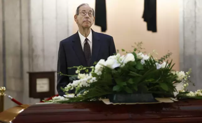 Former Ohio governor Bob Taft pauses at the casket for former Ohio House speaker Jo Ann Davidson as it lie in state in the rotunda of the Ohio Statehouse in Columbus, Ohio, Thursday, Oct. 31, 2024. (AP Photo/Paul Vernon)