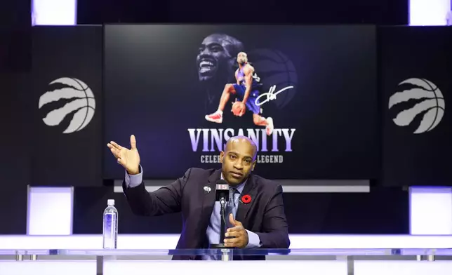 Former Toronto Raptors player Vince Carter speaks to media ahead of his number retirement, before an NBA basketball game between the Toronto Raptors and the Sacramento Kings at the Scotiabank arena in Toronto on Saturday, Nov. 2, 2024. (Christopher Katsarov/The Canadian Press via AP)