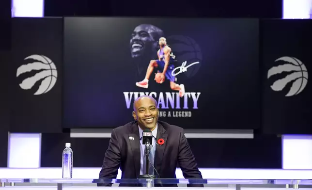 Former Toronto Raptors player Vince Carter speaks to media ahead of his number retirement, before an NBA basketball game between the Toronto Raptors and the Sacramento Kings at the Scotiabank arena in Toronto on Saturday, Nov. 2, 2024. (Christopher Katsarov/The Canadian Press via AP)