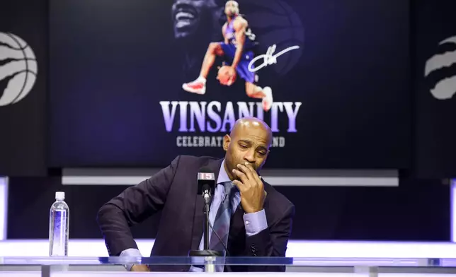 Former Toronto Raptors player Vince Carter speaks to media ahead of his number retirement, before an NBA basketball game between the Toronto Raptors and the Sacramento Kings at the Scotiabank arena in Toronto on Saturday, Nov. 2, 2024. (Christopher Katsarov/The Canadian Press via AP)