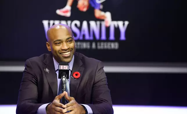 Former Toronto Raptors player Vince Carter speaks to media ahead of his number retirement, before an NBA basketball game between the Toronto Raptors and the Sacramento Kings at the Scotiabank arena in Toronto on Saturday, Nov. 2, 2024. (Christopher Katsarov/The Canadian Press via AP)