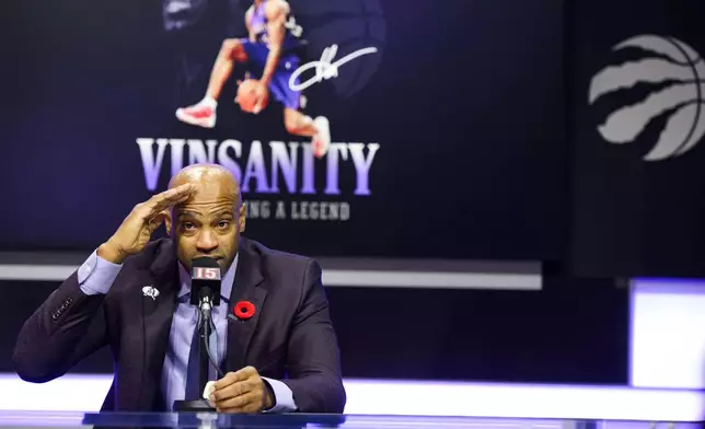 Former Toronto Raptors player Vince Carter speaks to media ahead of his number retirement, before an NBA basketball game between the Toronto Raptors and the Sacramento Kings at the Scotiabank arena in Toronto on Saturday, Nov. 2, 2024. (Christopher Katsarov/The Canadian Press via AP)