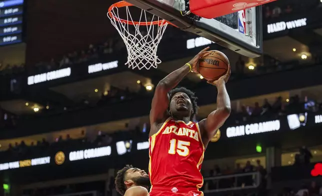 Atlanta Hawks center Clint Capela (15) goes up for a lay up during the first half of an NBA basketball game against the New York Knicks, Wednesday, Nov. 6, 2024, in Atlanta. (AP Photo/Jason Allen)