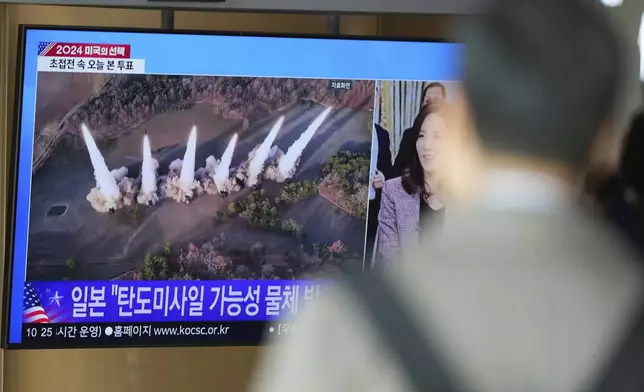 A TV screen shows a report of North Korea's multiple short-range ballistic missiles with file footage during a news program at the Seoul Railway Station in Seoul, South Korea, Tuesday, Nov. 5, 2024. (AP Photo/Lee Jin-man)