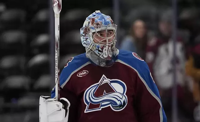 Colorado Avalanche goaltender Justus Annunen celebrates a win against the Seattle Kraken following an NHL hockey game Tuesday, Nov. 5, 2024, in Denver. (AP Photo/Jack Dempsey)