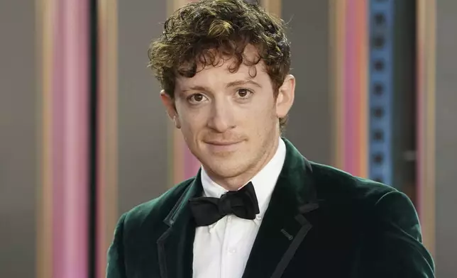 Ethan Slater arrives at the premiere of "Wicked" on Saturday, Nov. 9, 2024, at Dorothy Chandler Pavilion in Los Angeles. (Photo by Jordan Strauss/Invision/AP)