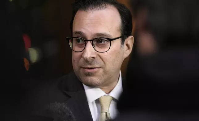 Michael Bachrach, defense attorney for Massachusetts Air National Guardsman Jack Teixeira, faces reporters outside federal court following a sentencing hearing for Teixeira, Tuesday, Nov. 12, 2024, in Boston. (AP Photo/Steven Senne)