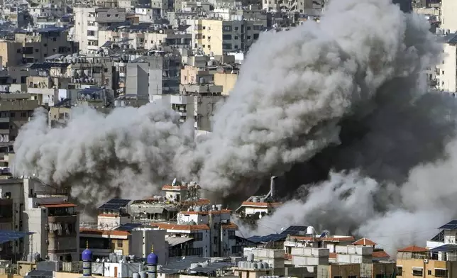 Smoke rises after an Israeli airstrike on Dahiyeh, in the southern suburb of Beirut, Lebanon, Tuesday, Nov. 12, 2024. (AP Photo/Bilal Hussein)