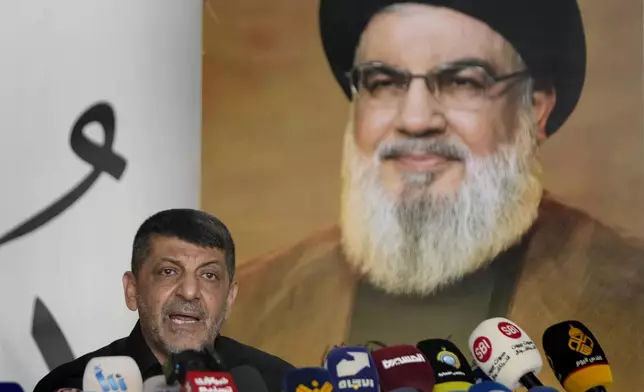 Hezbollah's chief spokesman Mohammed Afif speaks during a press conference in Dahiyeh, in the southern suburb of Beirut, Lebanon, Monday, Nov. 11, 2024. (AP Photo/Hussein Malla)