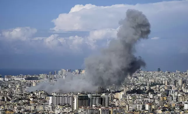 Smoke rises after an Israeli airstrike on Dahiyeh, in the southern suburb of Beirut, Lebanon, Tuesday, Nov. 12, 2024. (AP Photo/Bilal Hussein)