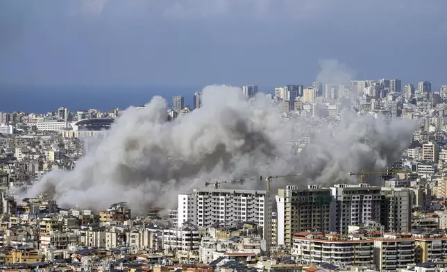 Smoke rises after an Israeli airstrike on Dahiyeh, in the southern suburb of Beirut, Lebanon, Tuesday, Nov. 12, 2024. (AP Photo/Bilal Hussein)