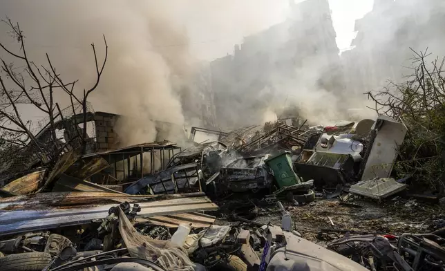 Smoke rises from the site of an Israeli airstrike in Dahiyeh, Beirut, Lebanon, Friday, Nov. 1, 2024. (AP Photo/Hassan Ammar)