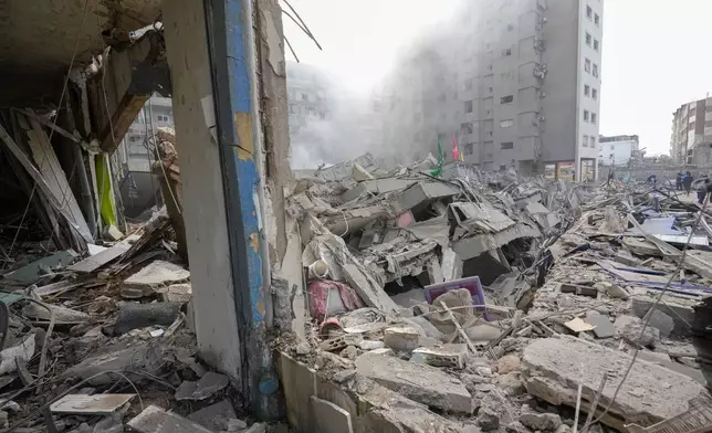 Smoke rises from the site of an Israeli airstrike in Dahiyeh, Beirut, Lebanon, Friday, Nov. 1, 2024. (AP Photo/Hassan Ammar)