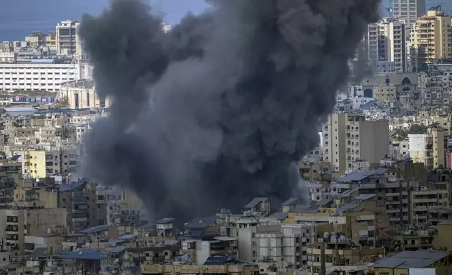 Smoke rises after an Israeli airstrike on Dahiyeh, in the southern suburb of Beirut, Lebanon, Wednesday, Nov. 13, 2024. (AP Photo/Hassan Ammar)