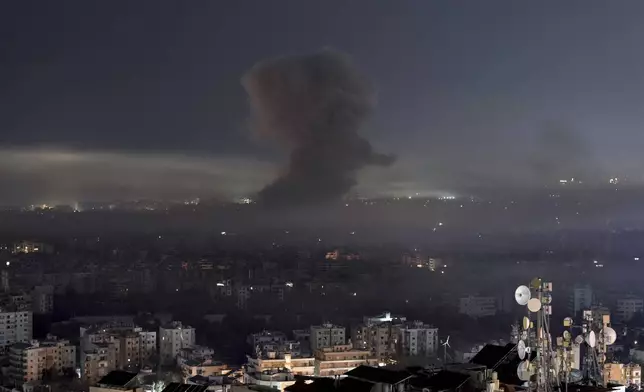 Smoke rises after an Israeli airstrike on Dahiyeh, in the southern suburb of Beirut, early Saturday, Nov. 9, 2024. (AP Photo/Bilal Hussein)