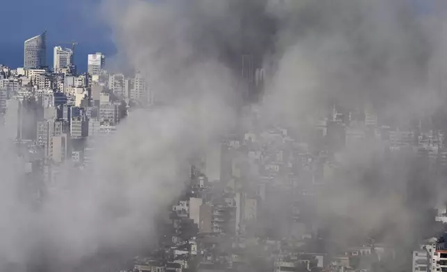 Smoke rises after an Israeli airstrike on Dahiyeh, in the southern suburb of Beirut, Lebanon, Tuesday, Nov. 12, 2024. (AP Photo/Bilal Hussein)