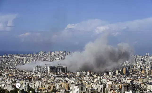 Smoke rises after an Israeli airstrike on Dahiyeh, in the southern suburb of Beirut, Lebanon, Tuesday, Nov. 12, 2024. (AP Photo/Bilal Hussein)