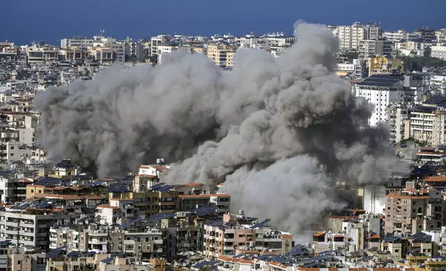 Smoke rises after an Israeli airstrike on Dahiyeh, in the southern suburb of Beirut, Lebanon, Tuesday, Nov. 12, 2024. (AP Photo/Bilal Hussein)