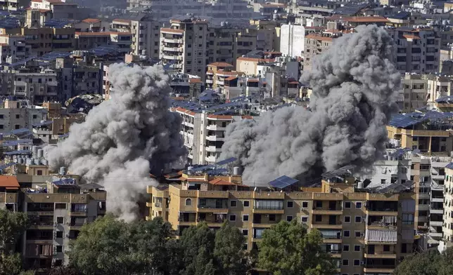 Smoke rises after an Israeli airstrike on Dahiyeh, in the southern suburb of Beirut, Lebanon, Tuesday, Nov. 12, 2024. (AP Photo/Bilal Hussein)