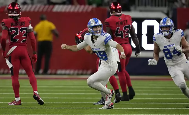 Detroit Lions kicker Jake Bates (39) celebrates after kicking the game-winning field goal against the Houston Texans during the fourth quarter of an NFL football game Sunday, Nov. 10, 2024, in Houston. (AP Photo/David J. Phillip)