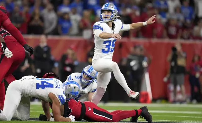 Detroit Lions place kicker Jake Bates (39) kicks a 58-yard field goal during the second half of an NFL football game against the Houston Texans, Sunday, Nov. 10, 2024, in Houston. (AP Photo/Eric Christian Smith)