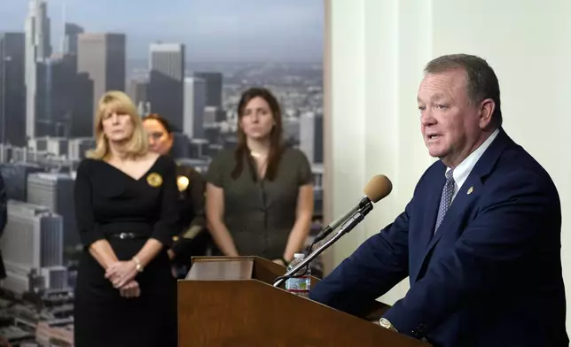 Newly sworn-in Chief of Police James McDonnell takes questions from the media after Los Angeles City Council confirmed him as the city's new police chief at a Council's public safety committee meeting on Friday, Nov. 8, 2024, in Los Angeles. (AP Photo/Damian Dovarganes)