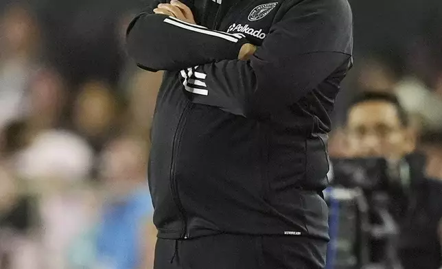 Inter Miami head coach Gerardo "Tata" Martino stands on the sidelines during the first half of an MLS playoff opening round soccer match against Atlanta United, Saturday, Nov. 9, 2024, in Fort Lauderdale, Fla. (AP Photo/Rebecca Blackwell)