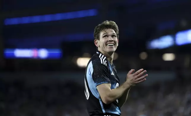 Minnesota United midfielder Will Trapp reacts during the second half of a first-round soccer match of the MLS Cup playoffs against Real Salt Lake in St. Paul, Minn., Saturday, Nov. 2, 2024. (AP Photo/Ellen Schmidt)