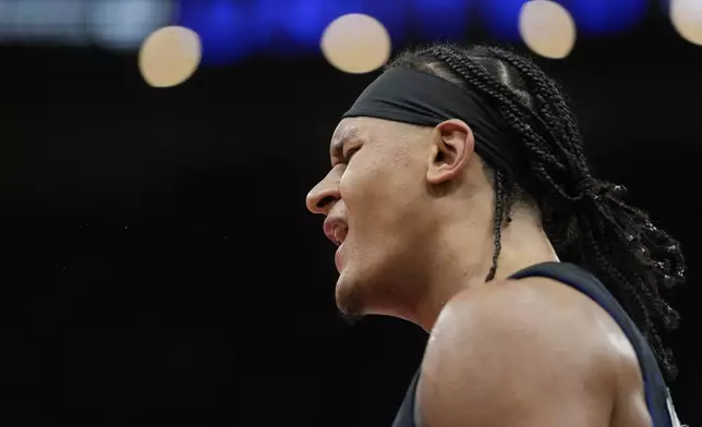 Orlando Magic forward Paolo Banchero reacts to his team falling behind the Chicago Bulls during the second half of an NBA basketball game Wednesday, Oct. 30, 2024, in Chicago. (AP Photo/Erin Hooley)