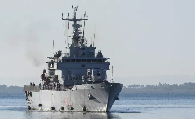 The Italian navy ship Libra approaches the port of Shengjin, northwestern Albania, Friday, Nov. 8, 2024, with the second group of eight migrants intercepted in international waters to be processed there in a reception facility despite the failure with the first group in October.(AP Photo/Vlasov Sulaj)