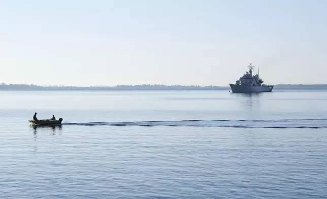 The Italian navy ship Libra approaches the port of Shengjin, northwestern Albania, Friday, Nov. 8, 2024, with the second group of eight migrants intercepted in international waters to be processed there in a reception facility despite the failure with the first group in October.(AP Photo/Vlasov Sulaj)