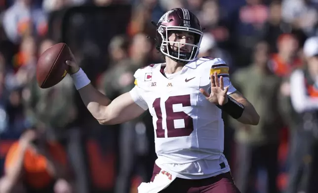 Minnesota quarterback Max Brosmer passes during the first half of an NCAA college football game against Illinois on Saturday, Nov. 2, 2024, in Champaign, Ill. (AP Photo/Charles Rex Arbogast)