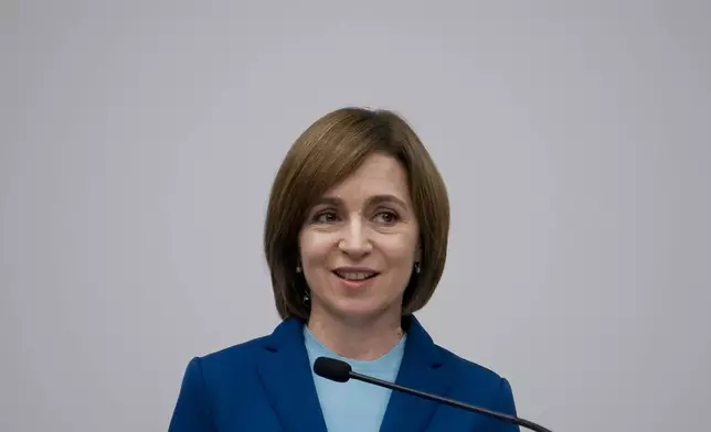 Moldova's President Maia Sandu speaks to the media during a press briefing after the polls closed for the presidential election runoff, in Chisinau, Moldova, Sunday, Nov. 3, 2024. (AP Photo/Vadim Ghirda)