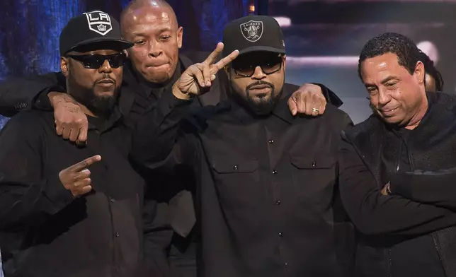 FILE - MC Ren, from left, Dr. Dre, Ice Cube and DJ Yella from N.W.A appear at the 31st Annual Rock and Roll Hall of Fame Induction Ceremony in New York on April 8, 2016. (Photo by Charles Sykes/Invision/AP, File)