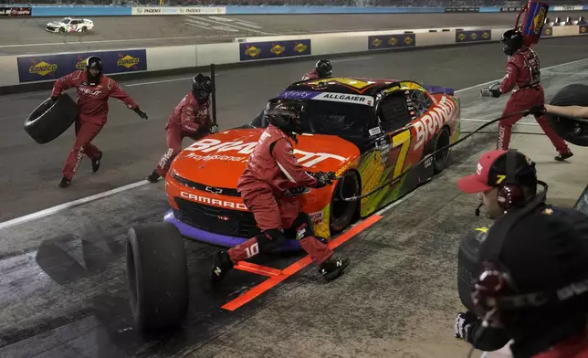 Justin Allgaier makes a pit stop during a NASCAR Xfinity Series auto race, Saturday, Nov. 9, 2024, in Avondale, Ariz. (AP Photo/John Locher)