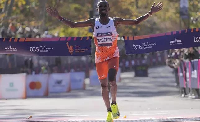 Abdi Nageeye, of the Netherlands, crosses the finish line to win the men's division of the New York City Marathon, Sunday, Nov. 3, 2024, in New York. (AP Photo/Frank Franklin II)