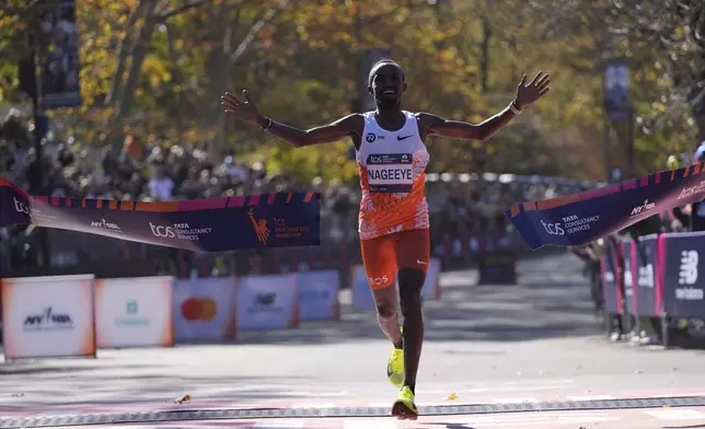 Abdi Nageeye, of the Netherlands, crosses the finish line to win the men's division of the New York City Marathon, Sunday, Nov. 3, 2024, in New York. (AP Photo/Frank Franklin II)