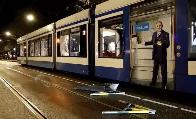 This image taken from video shows a damaged tram in Amsterdam, Monday Nov. 11, 2024, as the city is facing tensions following violence last week. (AP Photo)