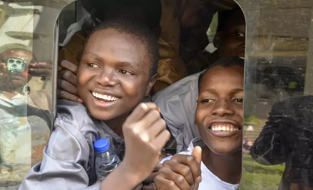 Children who had faced the death penalty for allegedly protesting against the country's cost of living crisis, are brought to a courtroom in Abuja, Nigeria Tuesday, Nov. 5, 2024. (AP Photo/Olamikan Gbemiga)