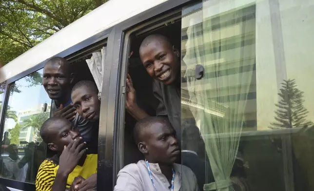 Children who had faced the death penalty for allegedly protesting against the country's cost of living crisis, are brought to a courtroom in Abuja, Nigeria Tuesday, Nov. 5, 2024. (AP Photo/Olamikan Gbemiga)