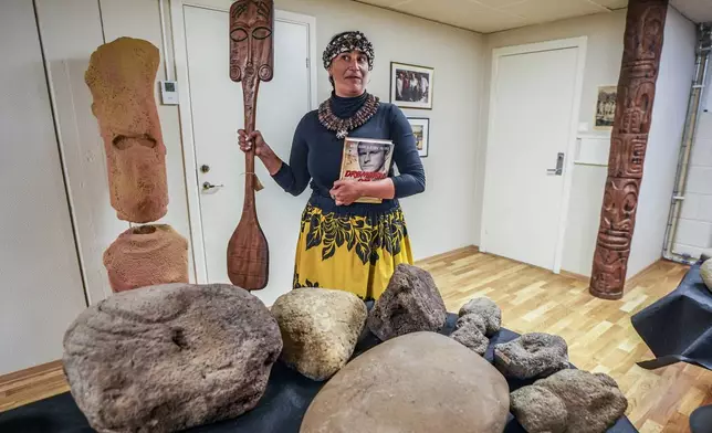 Rapa Nui Chilean politician Laura Tarita Rapu Alarcon attends the "repatriation" ceremony for artifacts and human remains, at the Kon Tiki Museum in Oslo, Norway, Tuesday, Nov. 12, 2024. (Lise Åserud/NTB Scanpix via AP)