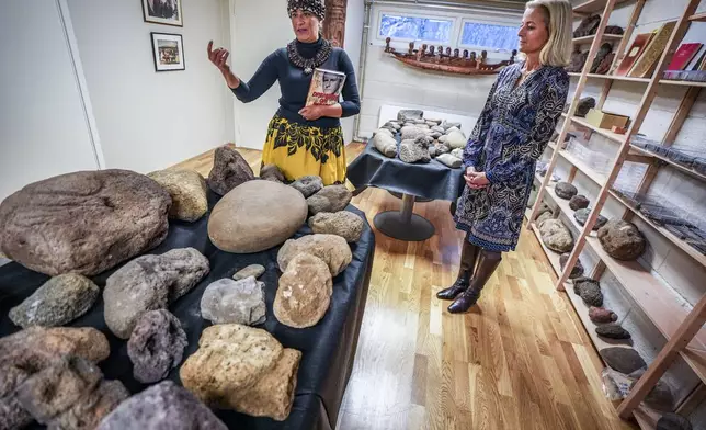 Kon-Tiki Museum's director Liv Heyerdahl, right, and Rapa Nui Chilean politician Laura Tarita Rapu Alarcon attend the "repatriation" ceremony for artifacts and human remains, at the Kon Tiki Museum in Oslo, Norway, Tuesday, Nov. 12, 2024. (Lise Åserud/NTB Scanpix via AP)