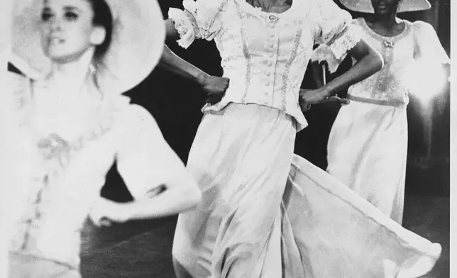 This undated photo provided by the Alvin Ailey Dance Foundation shows Judith Jamison, center, performing in Alvin Ailey's "Revelations." (Jack Mitchell/Alvin Ailey Dance Foundation and Smithsonian Institution via AP)