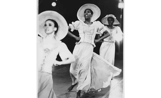 This undated photo provided by the Alvin Ailey Dance Foundation shows Judith Jamison, center, performing in Alvin Ailey's "Revelations." (Jack Mitchell/Alvin Ailey Dance Foundation and Smithsonian Institution via AP)