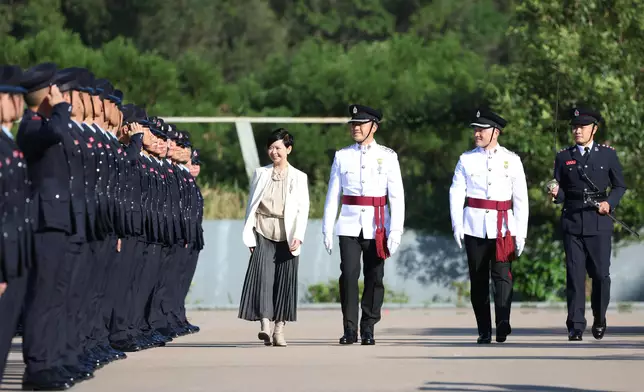 S for Housing reviews Fire Services passing-out parade  Source: HKSAR Government Press Releases