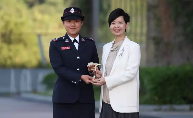 S for Housing reviews Fire Services passing-out parade  Source: HKSAR Government Press Releases