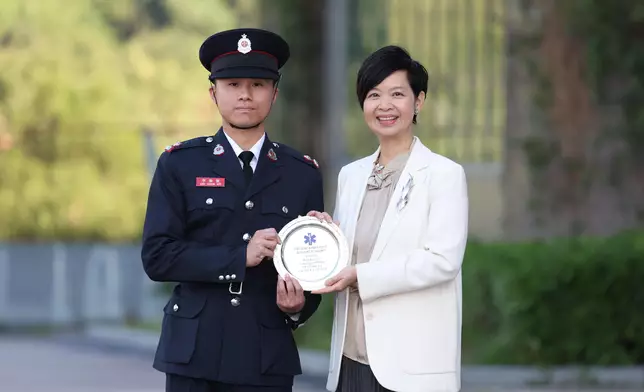 S for Housing reviews Fire Services passing-out parade  Source: HKSAR Government Press Releases